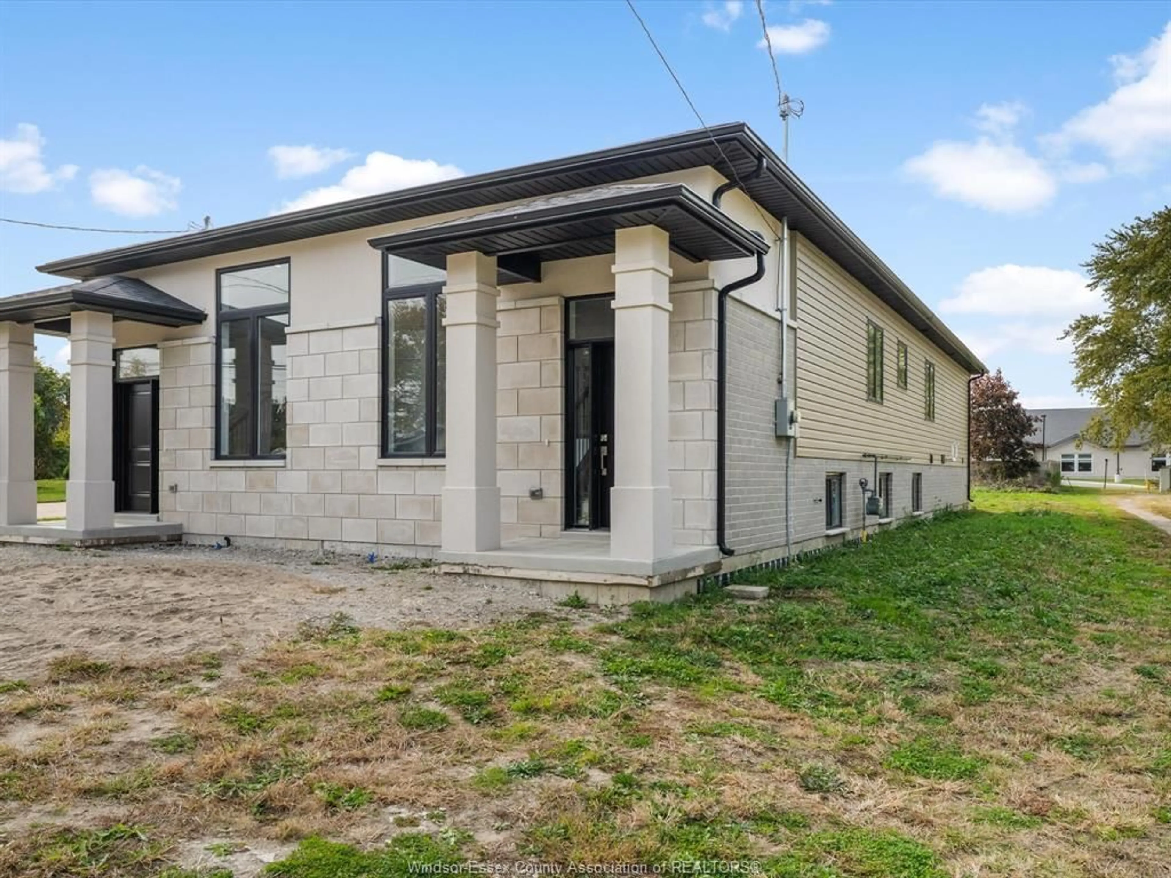 Home with brick exterior material, building for 1539 SHAWNEE Rd #B, Tecumseh Ontario N8N 1S3