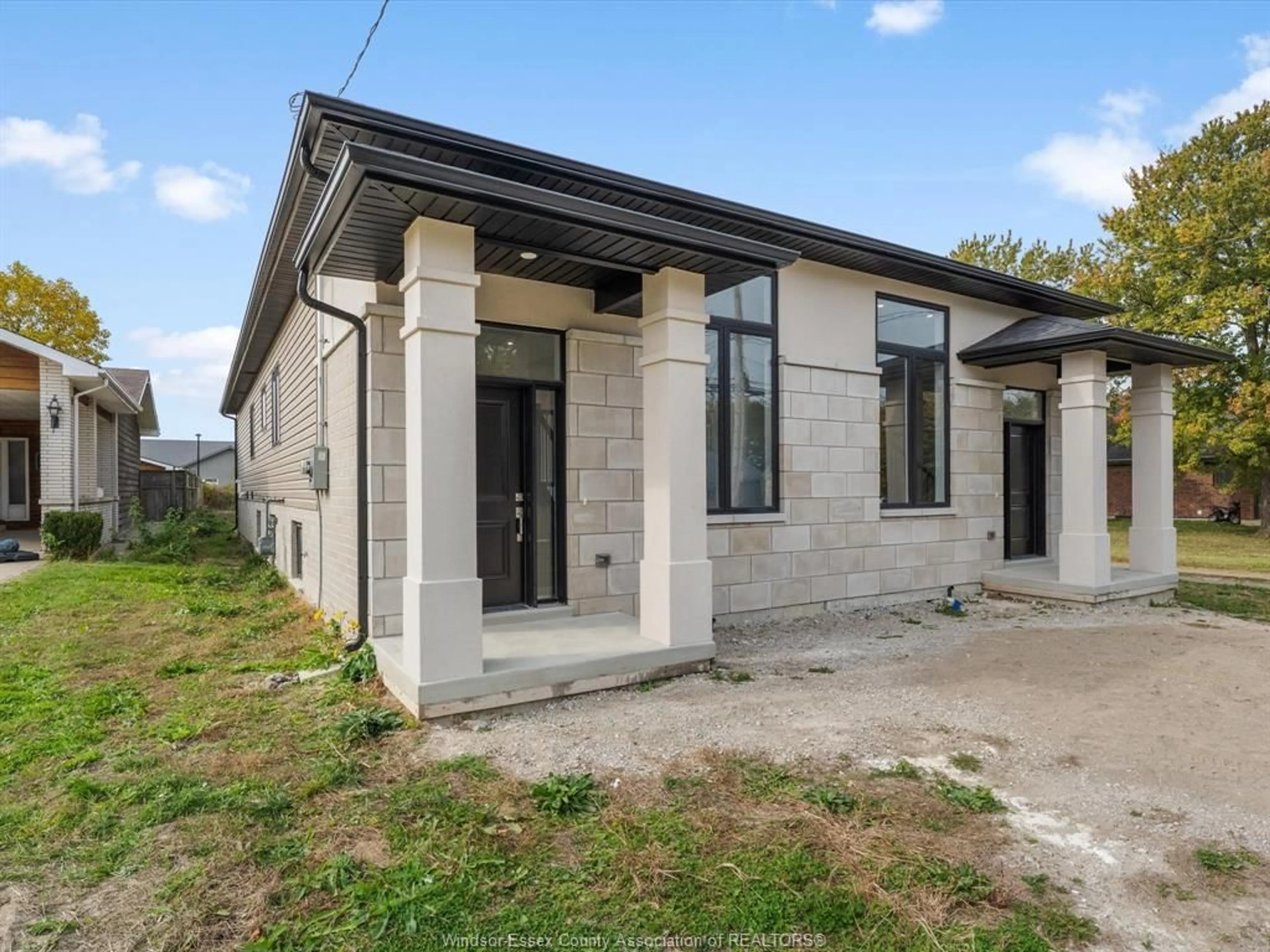 Home with brick exterior material, building for 1539 SHAWNEE Rd #B, Tecumseh Ontario N8N 1S3