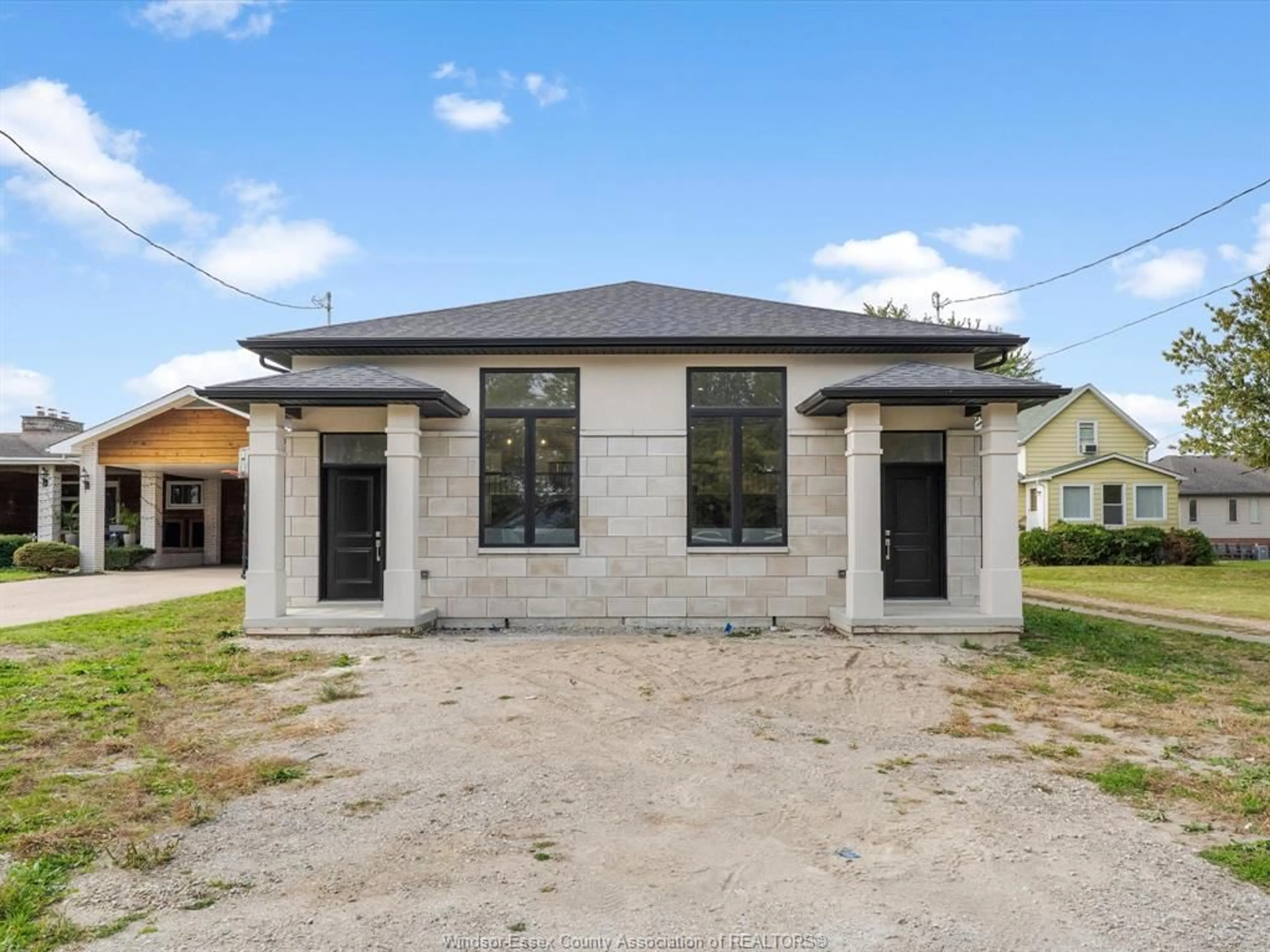 Home with brick exterior material, building for 1539 SHAWNEE Rd #B, Tecumseh Ontario N8N 1S3