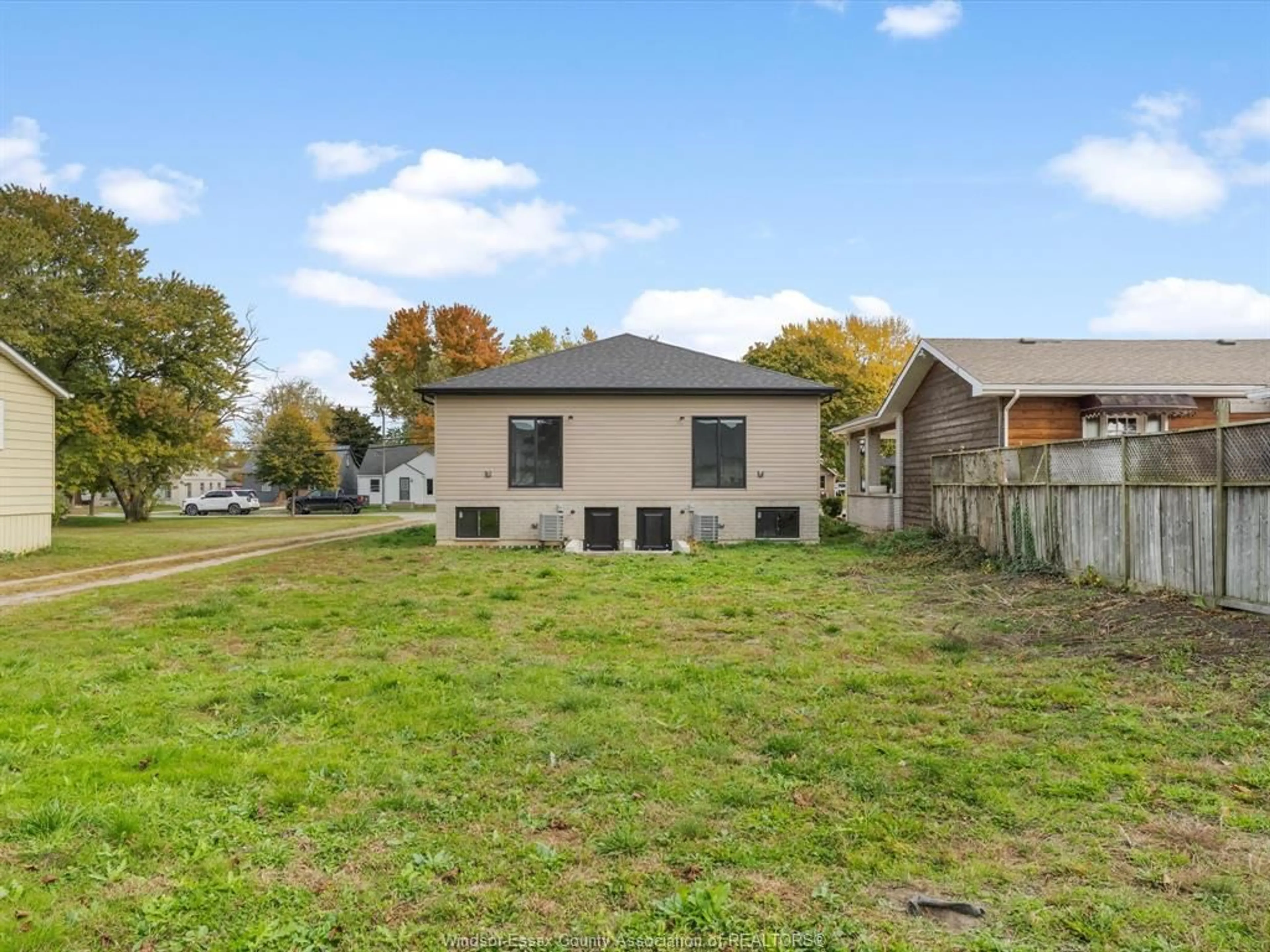 A pic from outside/outdoor area/front of a property/back of a property/a pic from drone, street for 1539 SHAWNEE Rd #A, Tecumseh Ontario N8N 1S3
