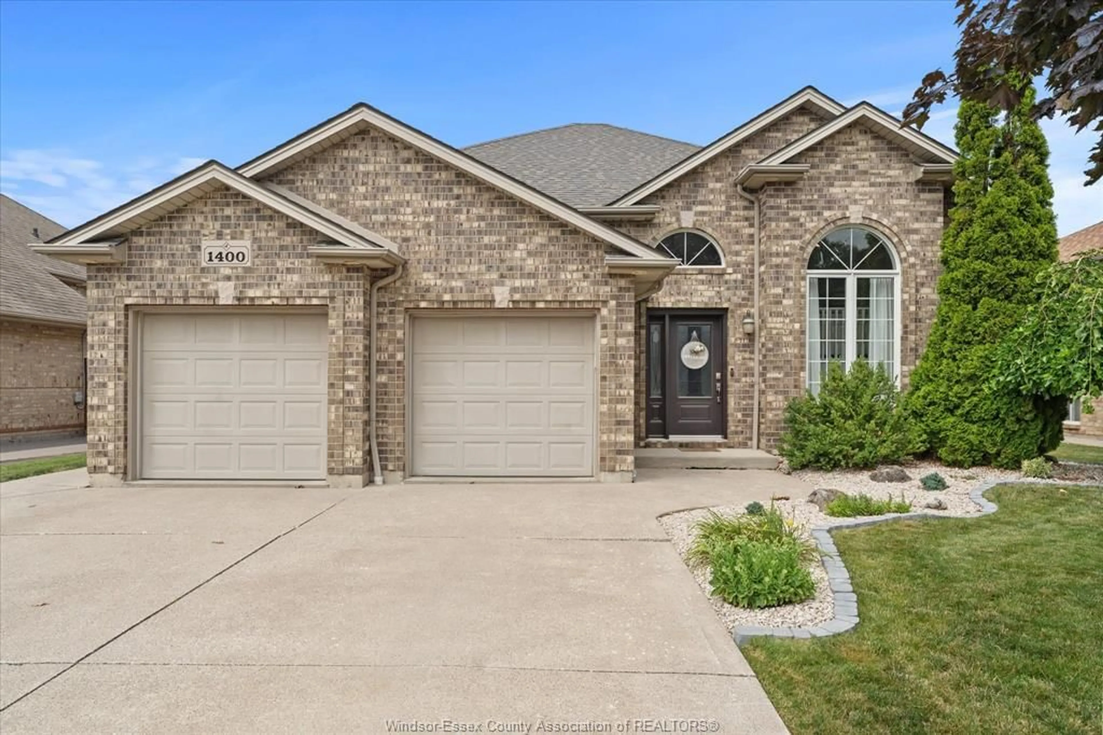 Home with brick exterior material, street for 1400 McMahon Cres, Lakeshore Ontario N0R 1A0