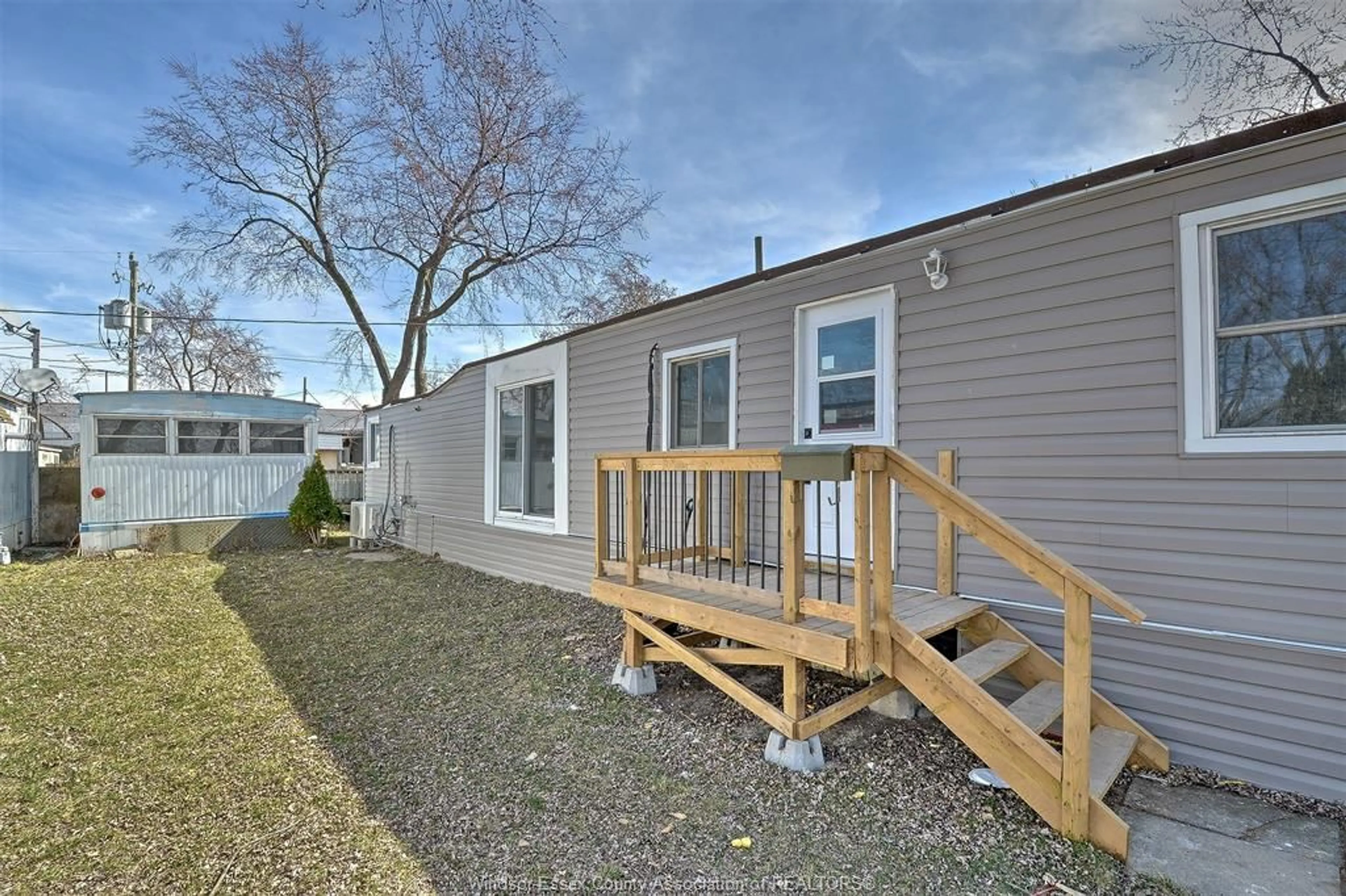 Home with vinyl exterior material, street for 216 BARRACUDA Ave, Windsor Ontario N8W 2B1