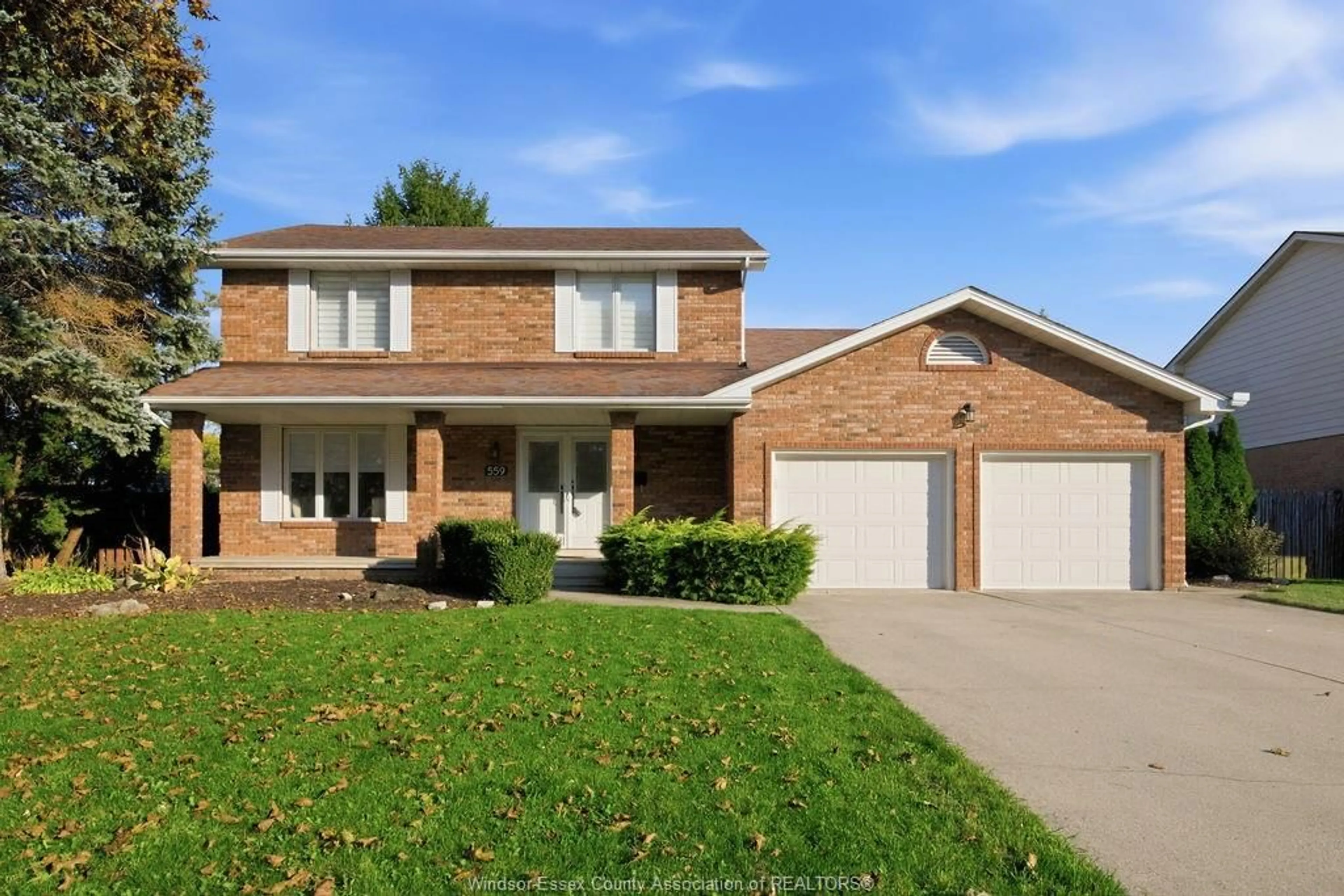 Home with brick exterior material, street for 559 HARBOURNE Cres, Tecumseh Ontario N8N 3J5