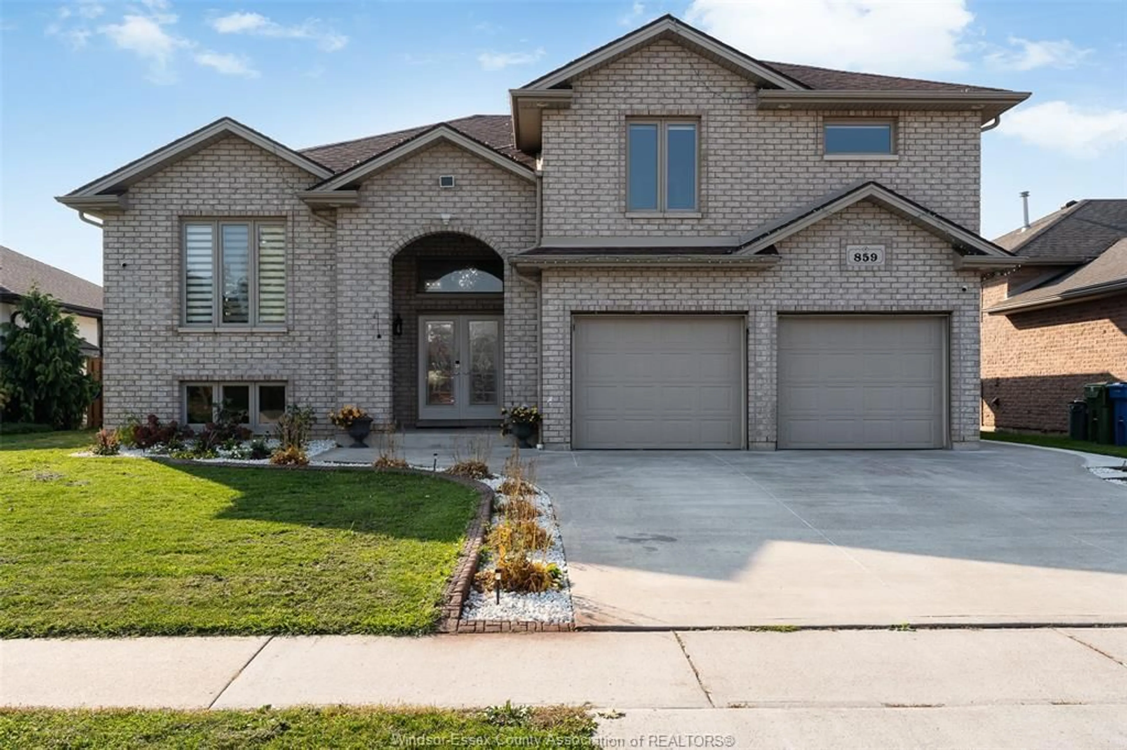 Home with brick exterior material, street for 859 SOUTHWOOD Dr, Lakeshore Ontario N8L 1G1