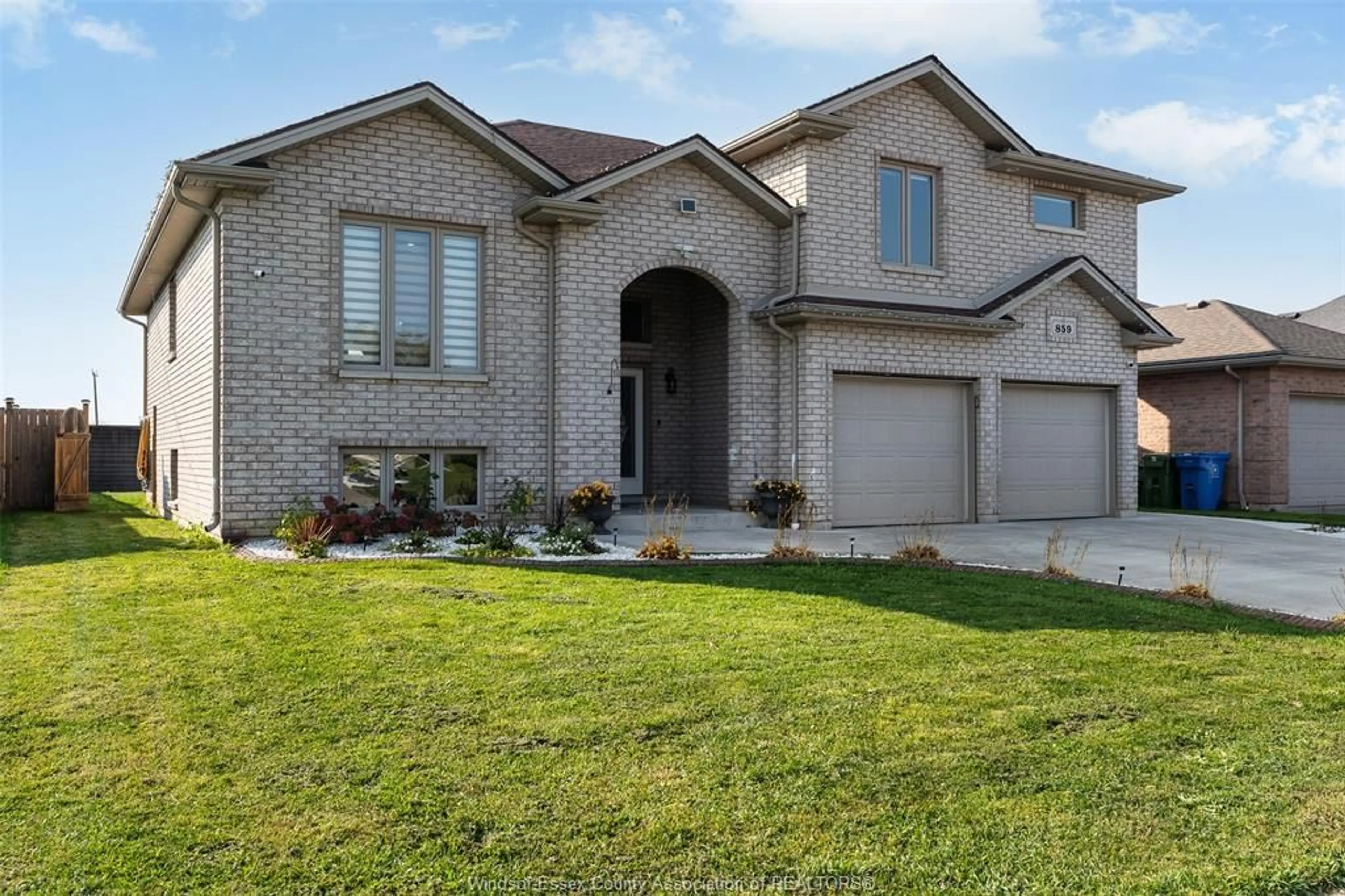 Home with brick exterior material, street for 859 SOUTHWOOD Dr, Lakeshore Ontario N8L 1G1