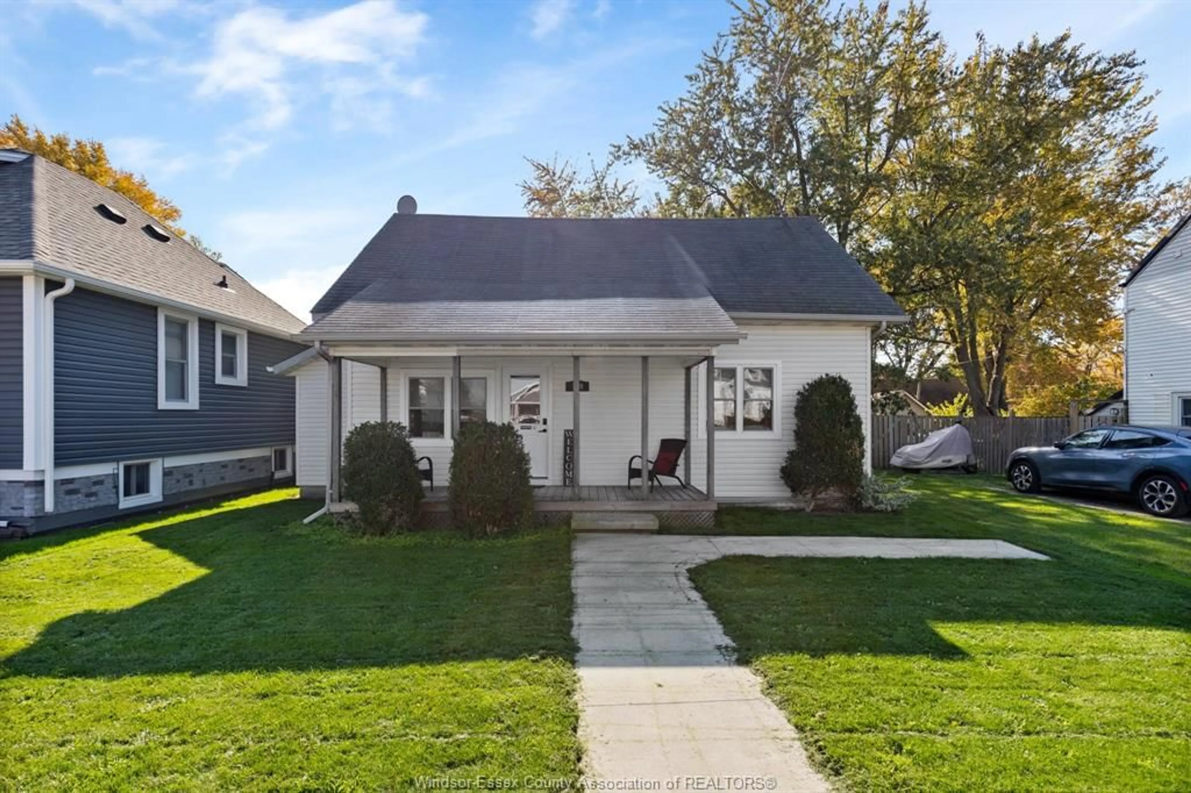 Home with vinyl exterior material, street for 179 SINASAC St, Harrow Ontario N0R 1G0