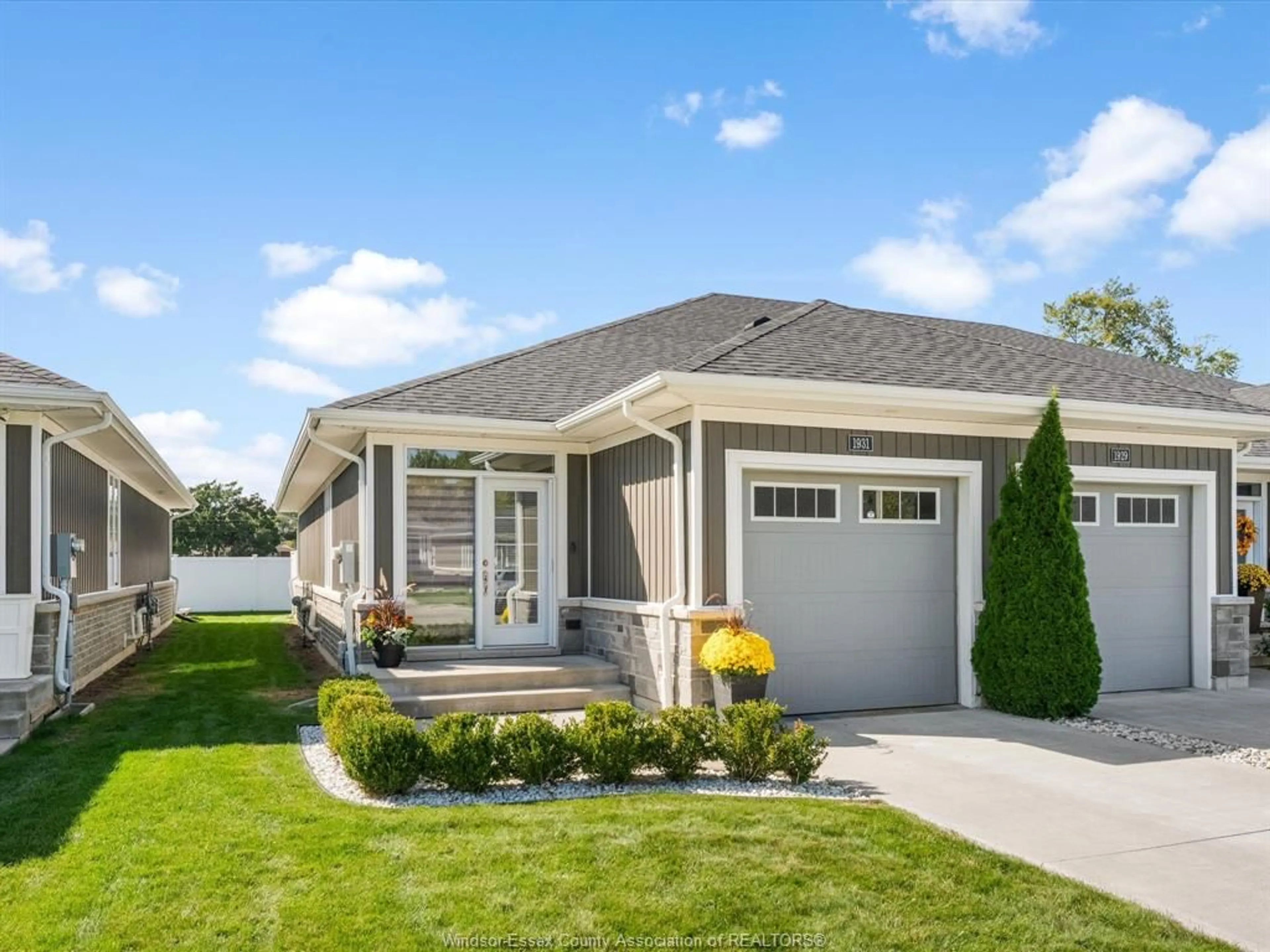 Home with vinyl exterior material, street for 1931 ETHAN Crt, Windsor Ontario N8T 0B3