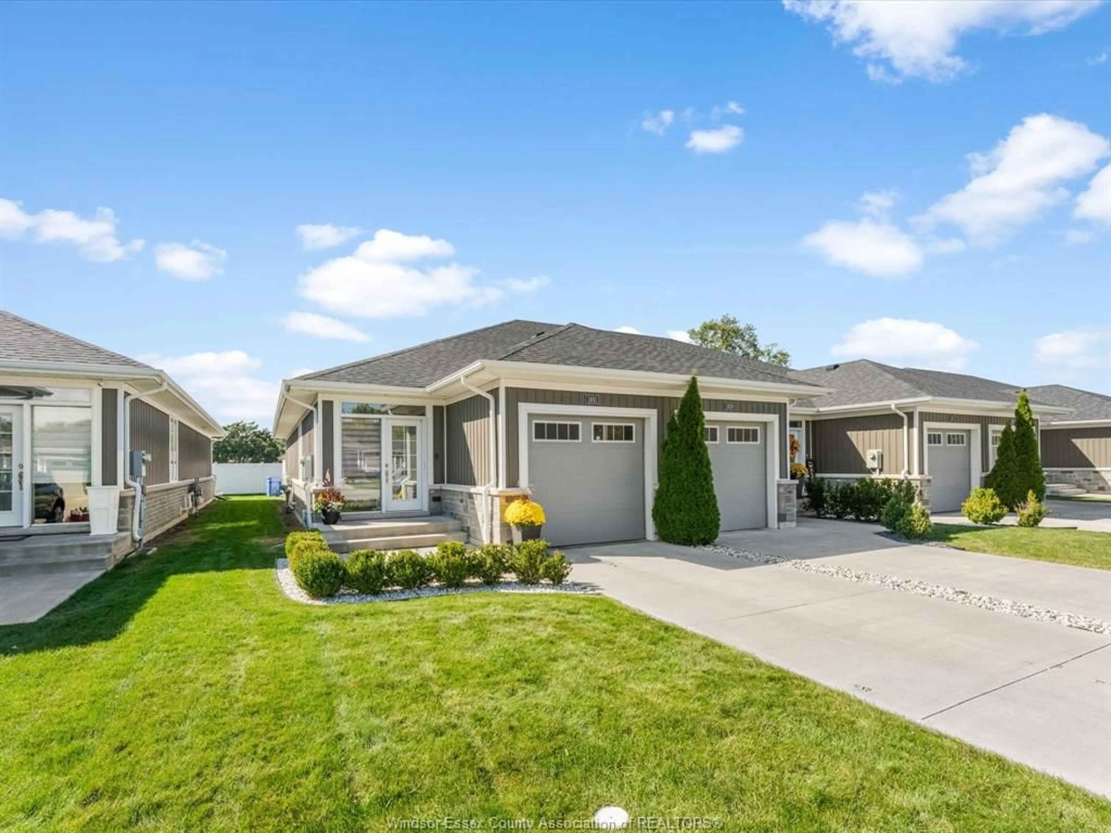 Home with vinyl exterior material, street for 1931 ETHAN Crt, Windsor Ontario N8T 0B3